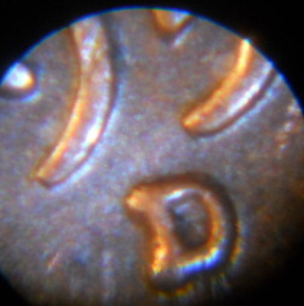 1957-D-RPM-Tripled-Top-Serrif,-Doubled-Bottom