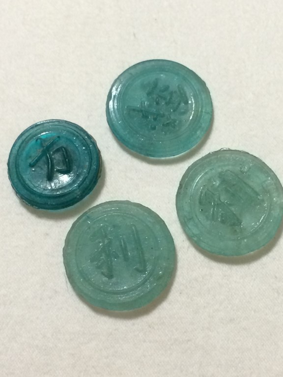 Plastic-Coins-Chinese-I-Think?