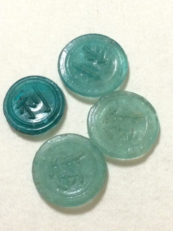 Plastic-Coins-Chinese-I-Think?