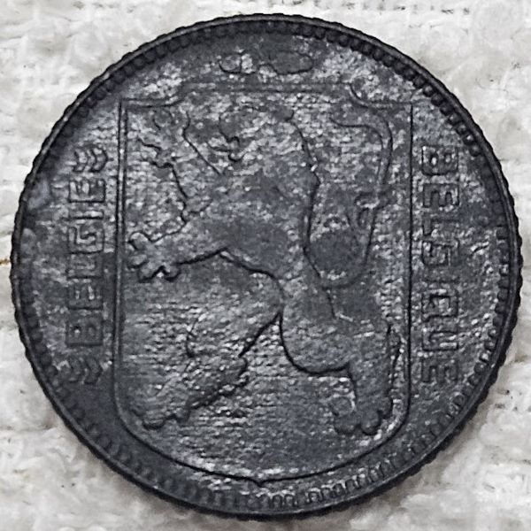 Attempting-A-Conservation-Of-A-Zinc-Belgium-1-Franc-Coin.