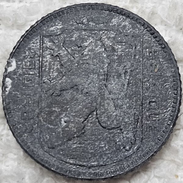Attempting-A-Conservation-Of-A-Zinc-Belgium-1-Franc-Coin.
