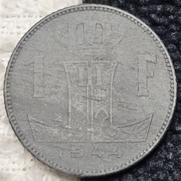 Attempting-A-Conservation-Of-A-Zinc-Belgium-1-Franc-Coin.