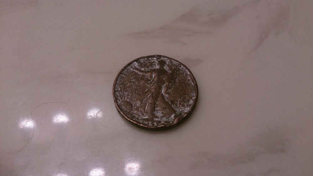 1943-Walking-Half-Made-Of-Clad?-Brass?-Help