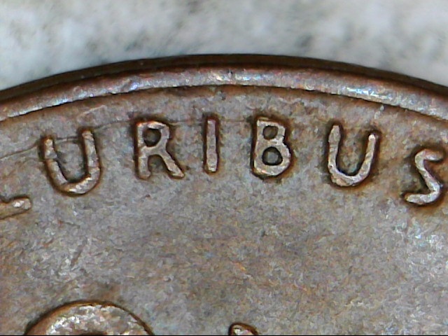 1945-Cent.-Has-Tiny-Raised-Line-Through-E-Pluribus.