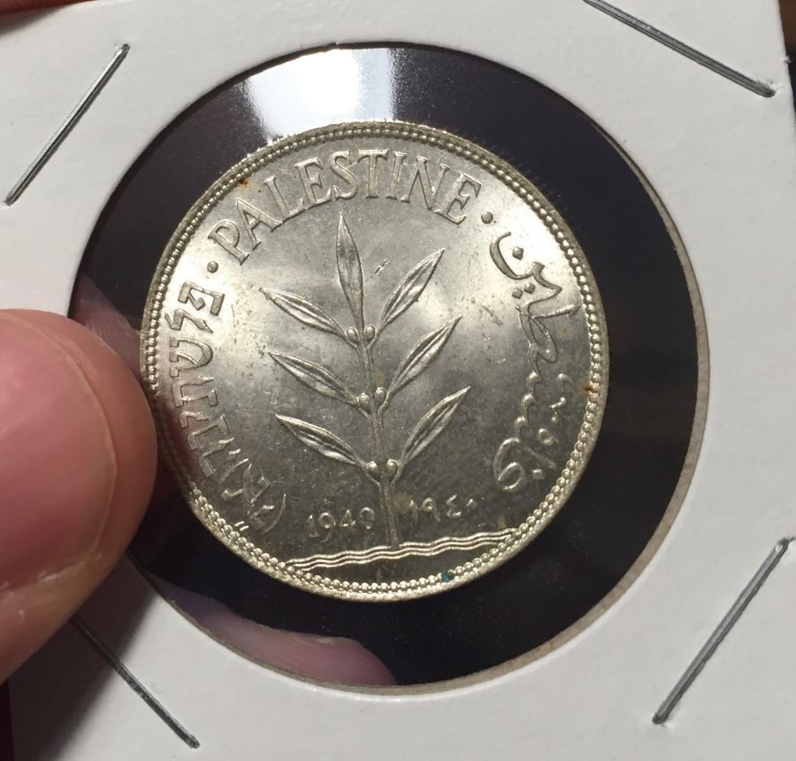What's-Up-With-This-100-Mils-Coin