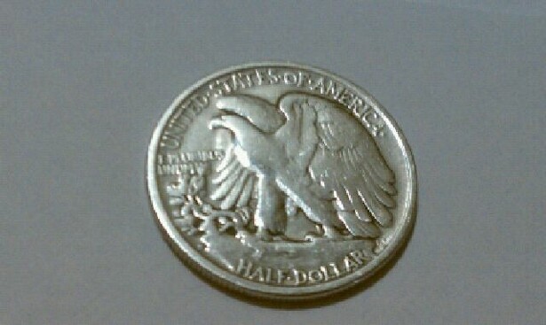 Strange-Stamp-On-1945-Walking-Liberty-Half