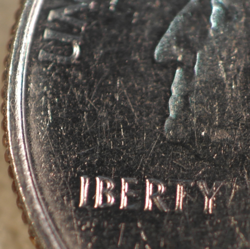 Uneven-Wear-On-2011-Quarter