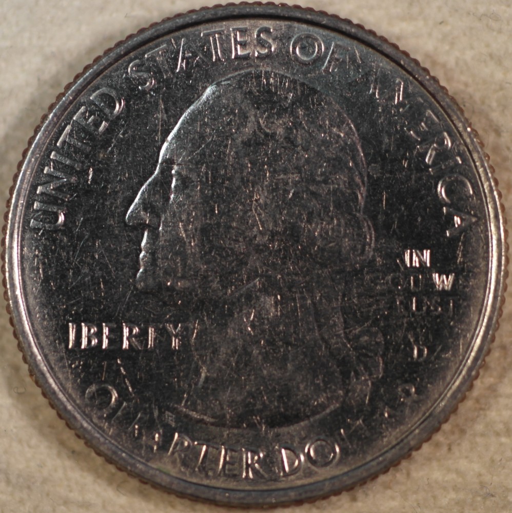 Uneven-Wear-On-2011-Quarter