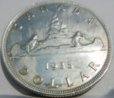 Please-Help-Grade-A-1935-Canadian-Silver-Dollar?