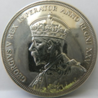 Please-Help-Grade-A-1935-Canadian-Silver-Dollar?