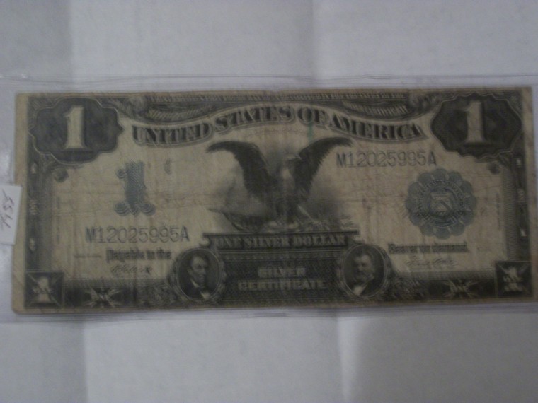 1899-$1-Black-Eagle....help-Grade