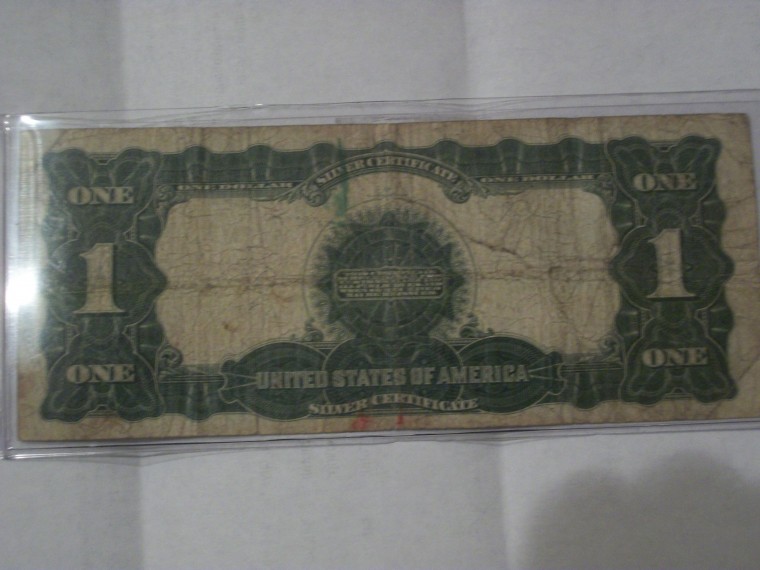 1899-$1-Black-Eagle....help-Grade