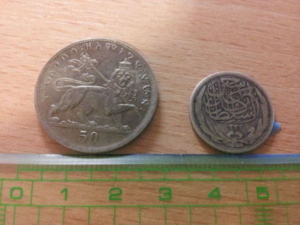 Two-Coins-For-ID-Please