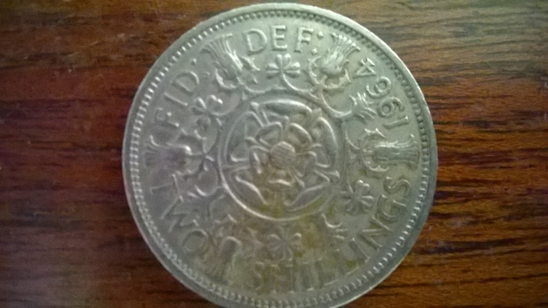 1964-UK-Two-Shilling-With-Back-Turned-Sideways?