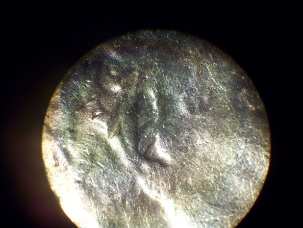 1961-D-Lincoln-With-Multiple-Curved-Lines-Inside-Ear