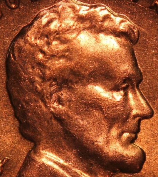 1961-D-Lincoln-With-Multiple-Curved-Lines-Inside-Ear