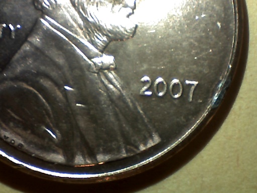 2007-Lincoln-Cent-Struck-Through-Foreign-Object.