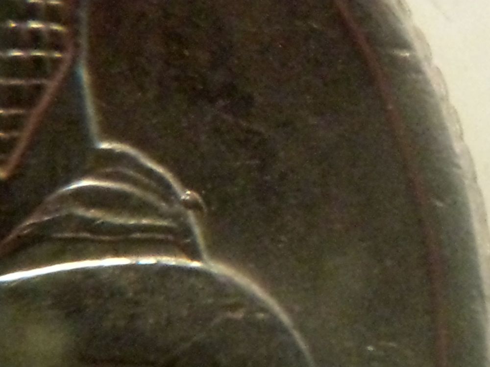 Is-This-A-Possible-Third-2004-D-Wisconsin-Quarter-Extra-Leaf-Quarter?