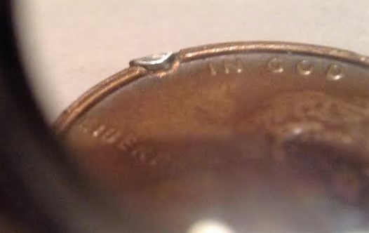 Help-1973-D-LMC..found-Silverish-Chunks-In-Penny.-Error,-Diebreak,-W/-Is-It?
