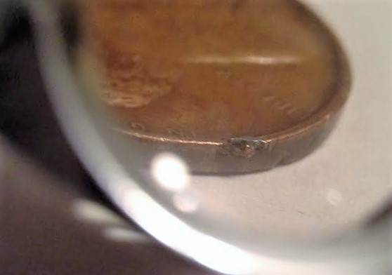 Help-1973-D-LMC..found-Silverish-Chunks-In-Penny.-Error,-Diebreak,-W/-Is-It?