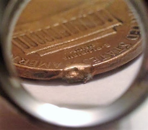 Help-1973-D-LMC..found-Silverish-Chunks-In-Penny.-Error,-Diebreak,-W/-Is-It?