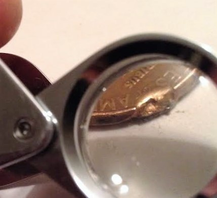 Help-1973-D-LMC..found-Silverish-Chunks-In-Penny.-Error,-Diebreak,-W/-Is-It?