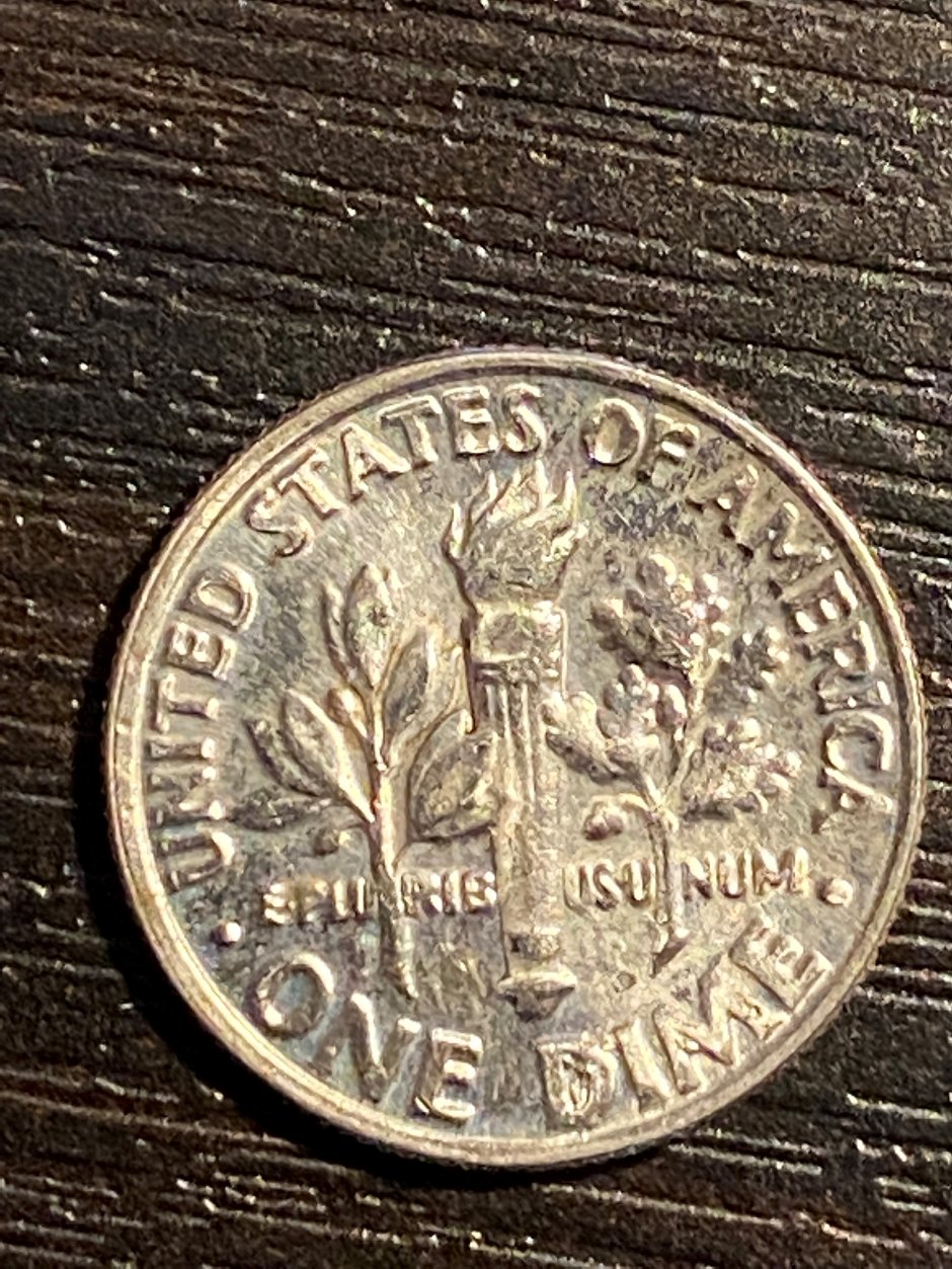 1990-P-Off-Center-And-Blemish-Below-Neck