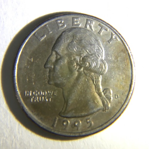 1995-D-Quarter.-Interesting-Toning?