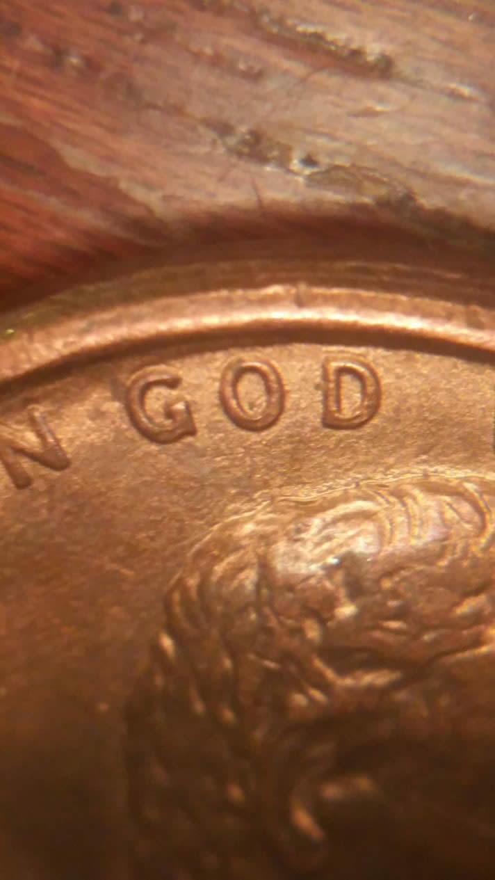 '89-D-Penny-W/-Odd-Looking-God