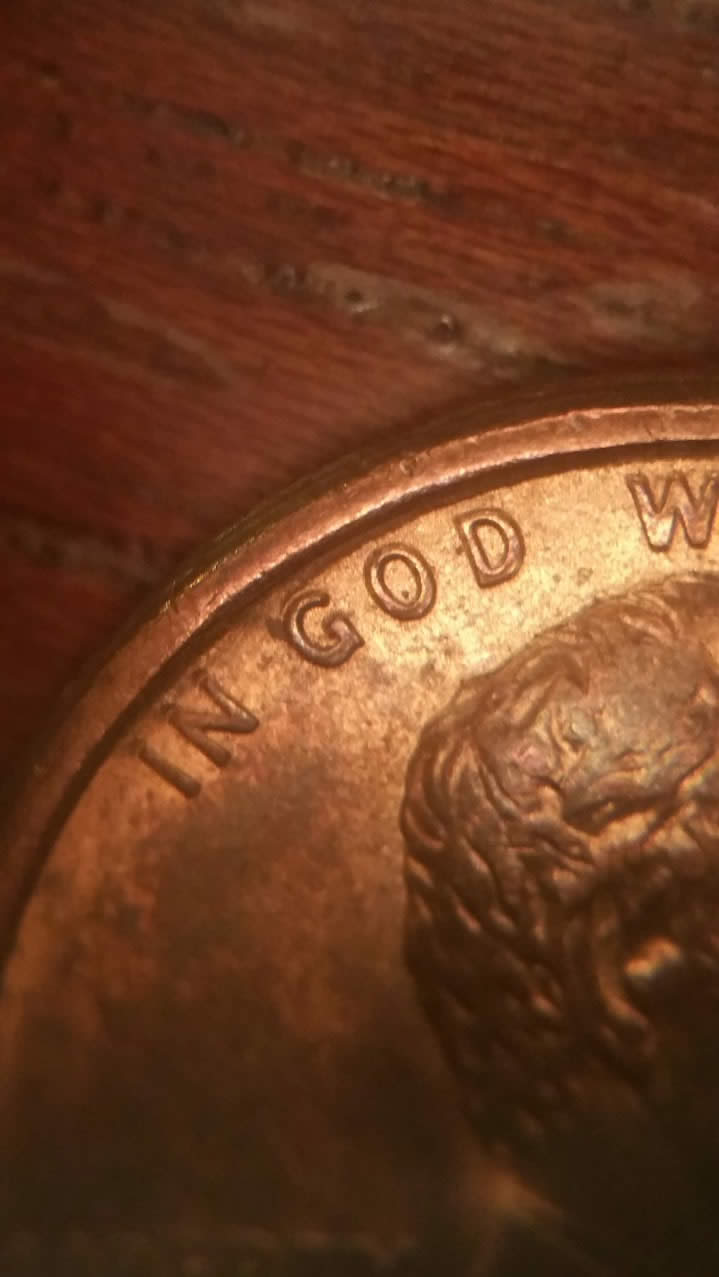 '89-D-Penny-W/-Odd-Looking-God