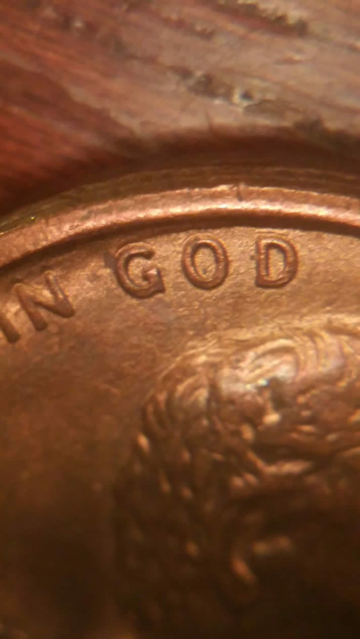 '89-D-Penny-W/-Odd-Looking-God