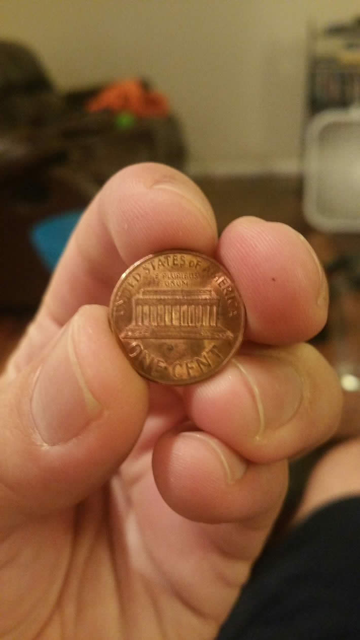 '89-D-Penny-W/-Odd-Looking-God
