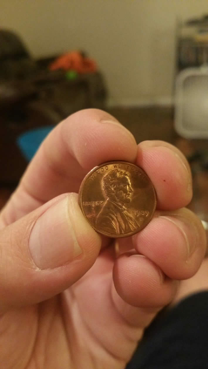 '89-D-Penny-W/-Odd-Looking-God