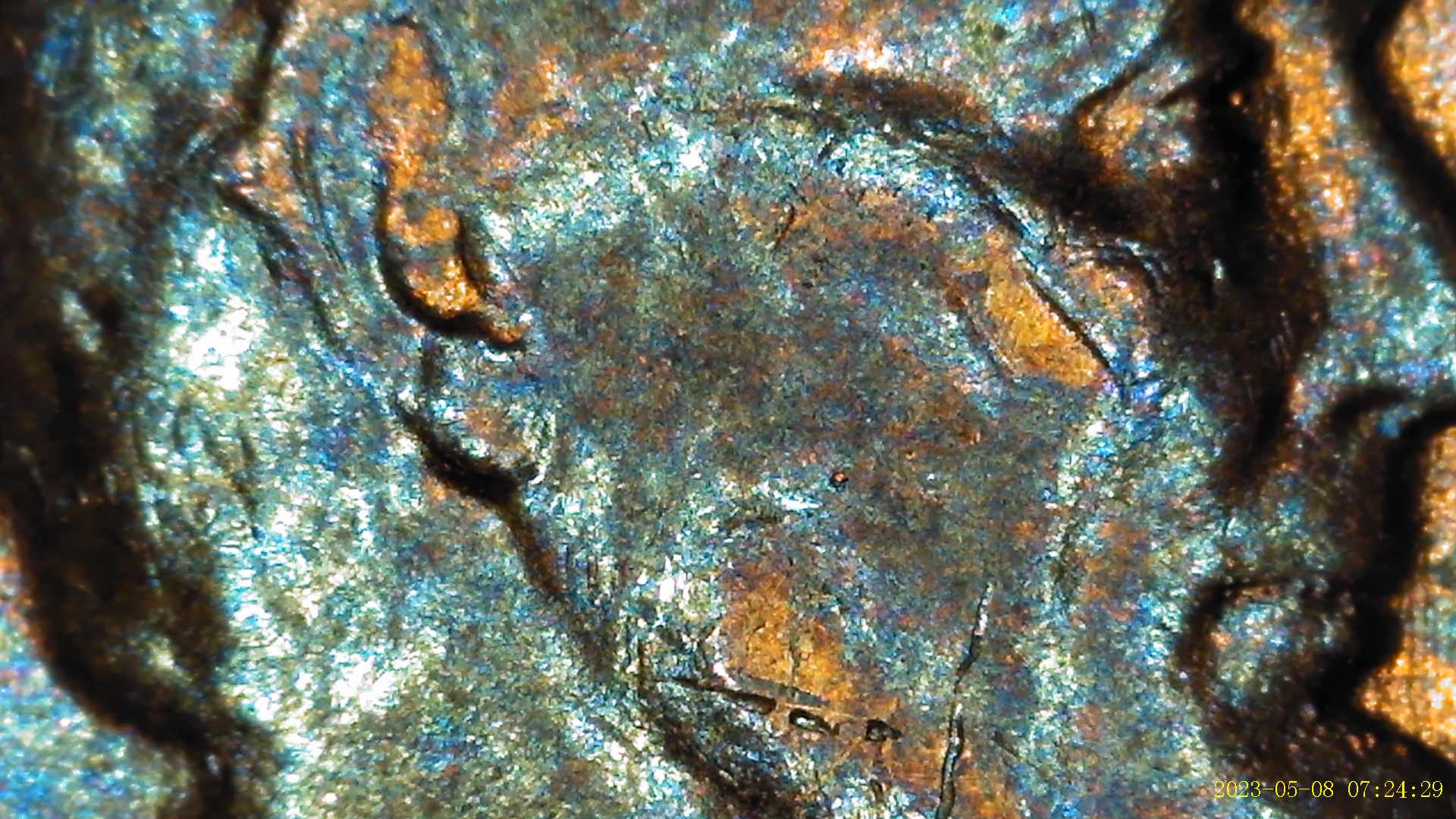 1955-Lincoln-Penny-Appearing-To-Have-Extra-Material-By-Ear-Lobe
