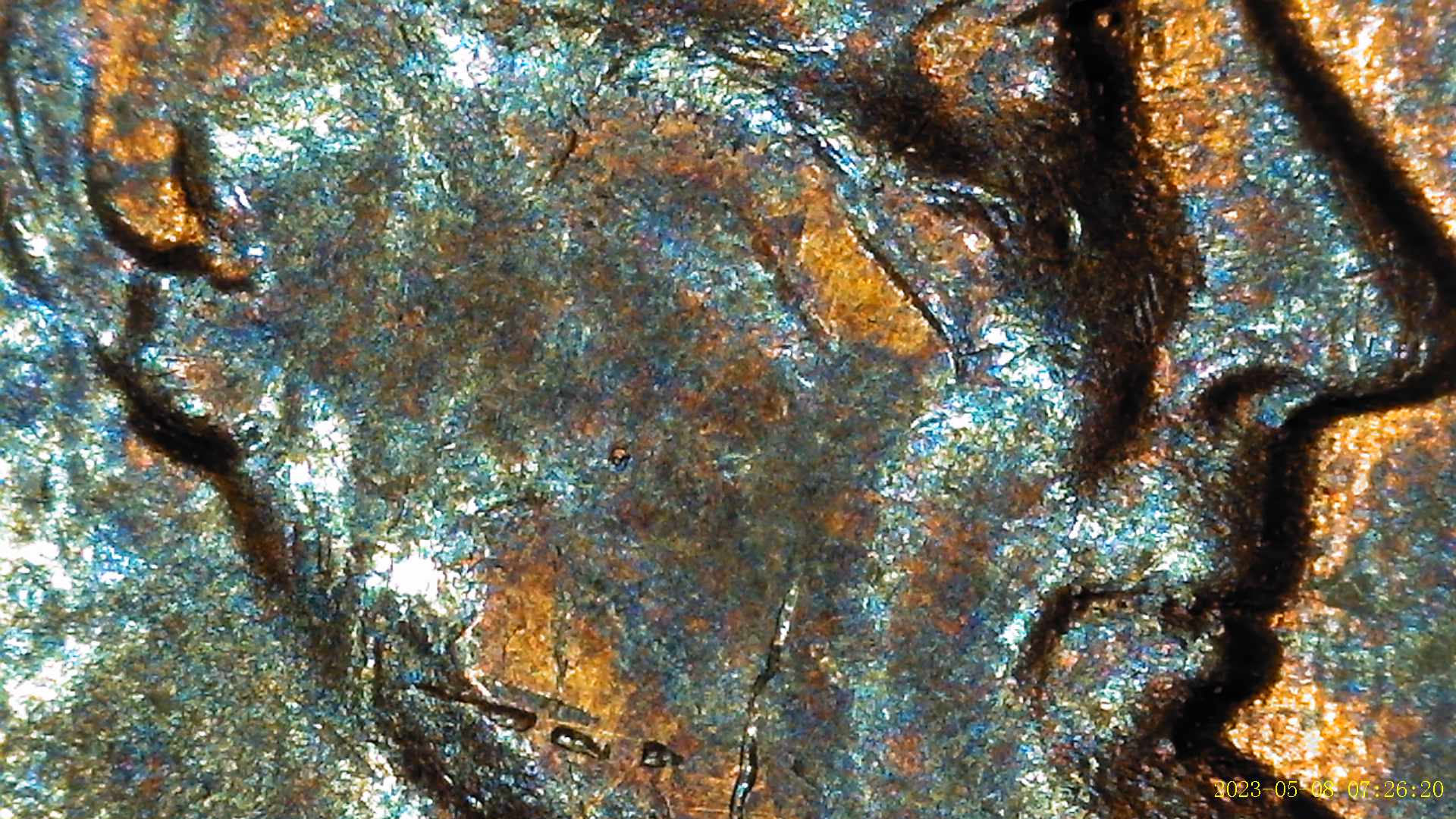1955-Lincoln-Penny-Appearing-To-Have-Extra-Material-By-Ear-Lobe