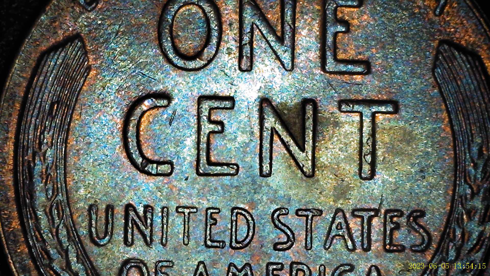 1955-Lincoln-Penny-Appearing-To-Have-Extra-Material-By-Ear-Lobe