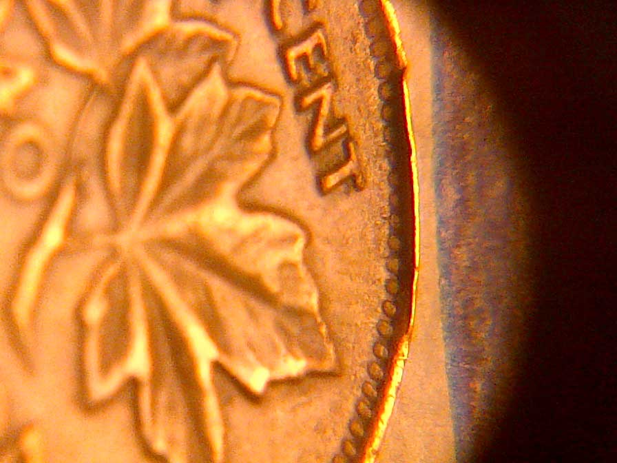 1940-Canada-Cent--Damage-Planchet?
