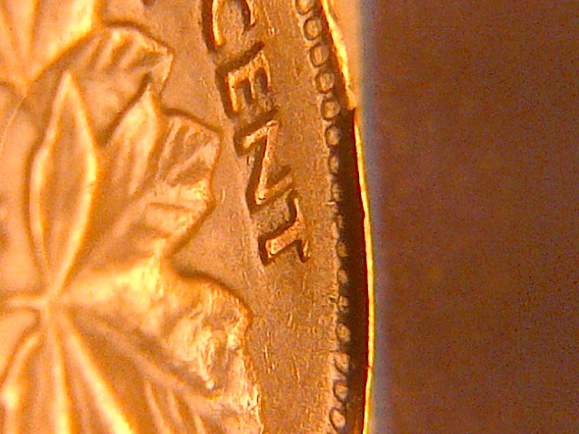 1940-Canada-Cent--Damage-Planchet?