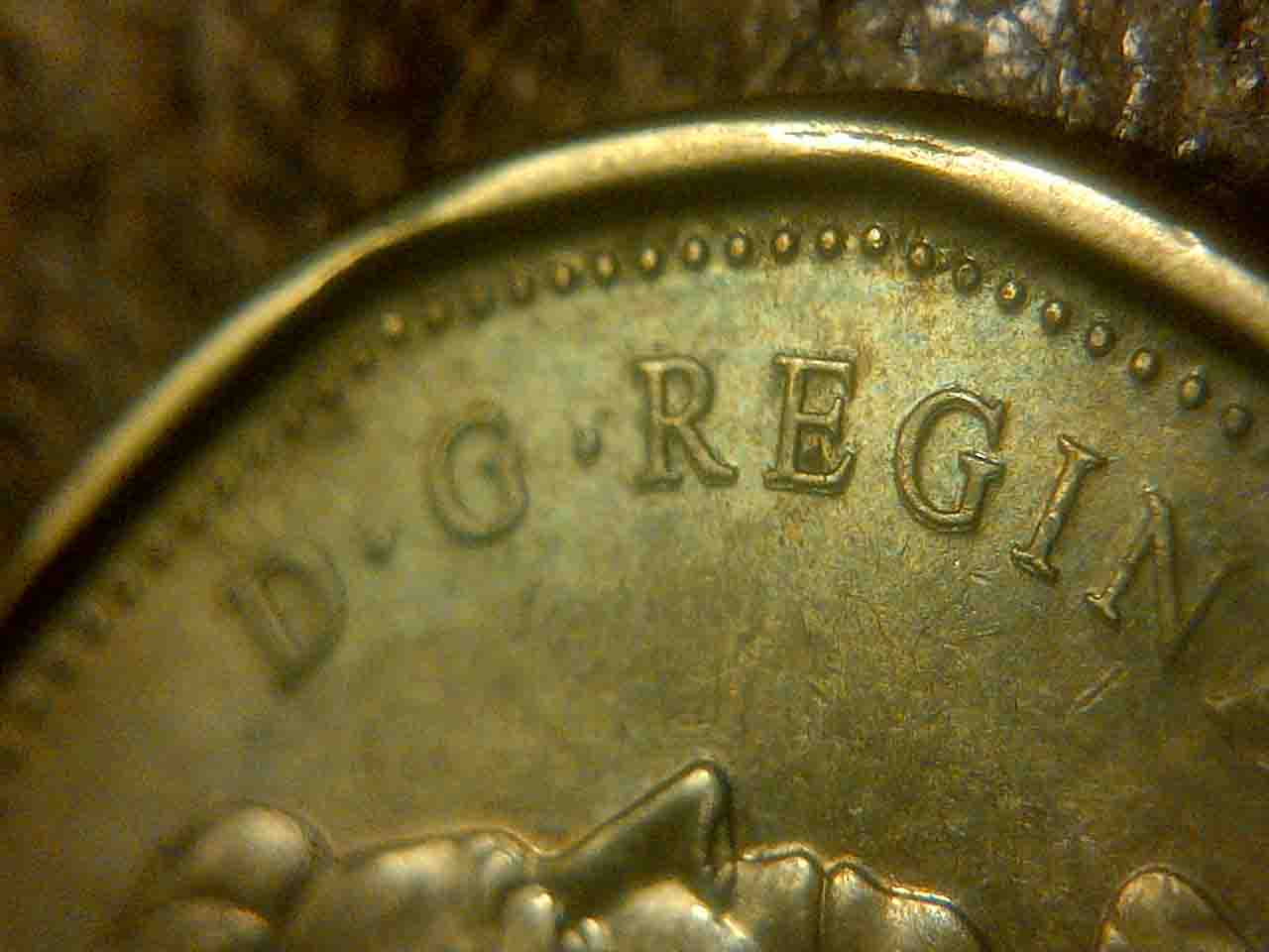Help-On-This-2-Canadian-1-Dollar-Coins