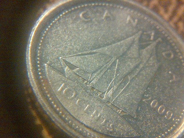Any-Ideas-On-This--Canadian-10-Cents