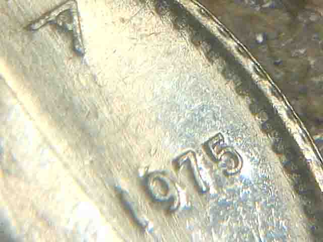 1975-10-Cents-Any-Ideas-On-This-One