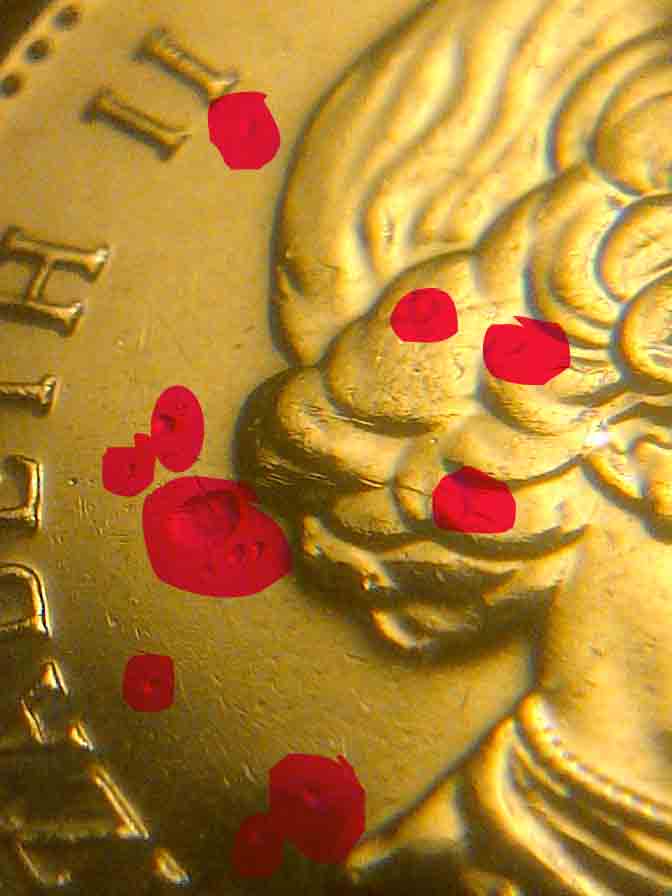 2012-5-Cents-Struck-Though-Debris