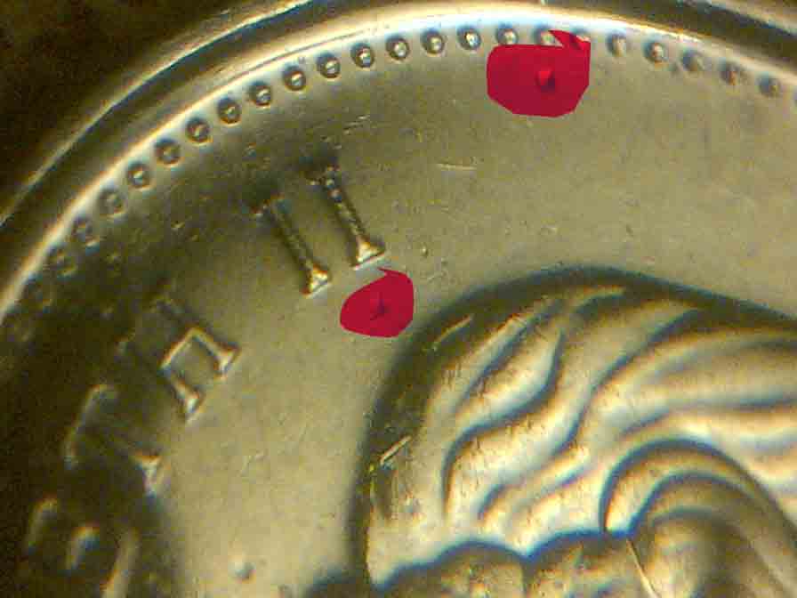 2012-5-Cents-Struck-Though-Debris