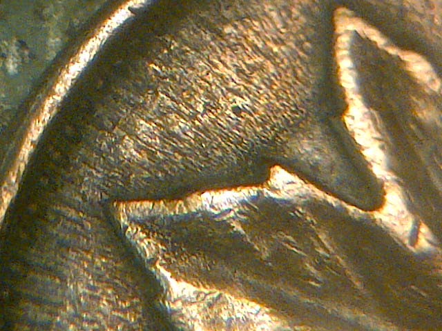 Here-Is-A-Partially--Rippled--Cent