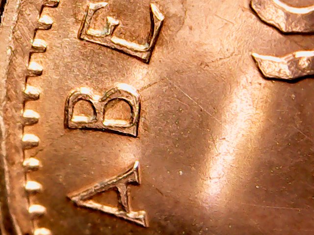 Is-This-An-Error-On-This-Canadian-Cent