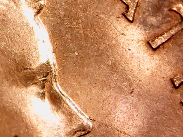 Is-This-An-Error-On-This-Canadian-Cent