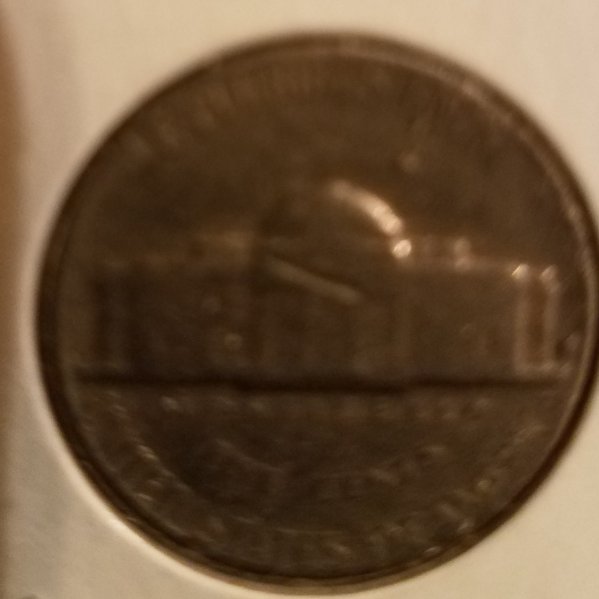 64-Nickel-Very-Strange-Mint-Mark