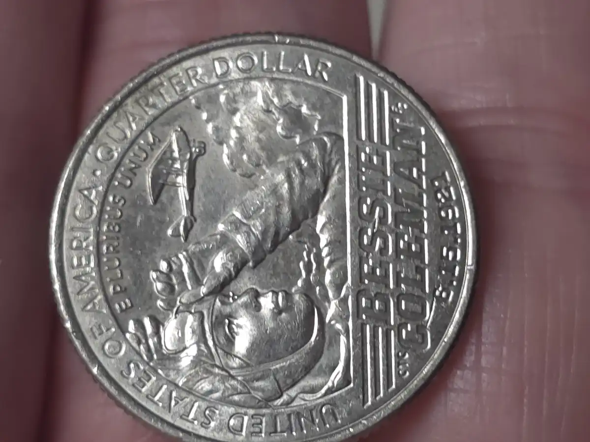 2023-Bessie-Coleman-Quarter-/What-Causes-These-Scratches-Behind-The-Design?