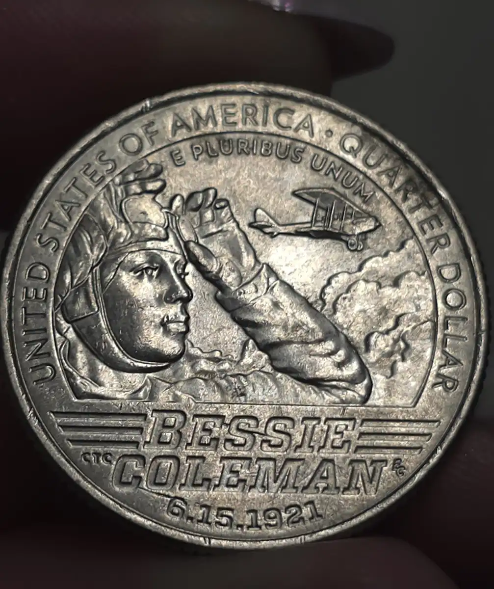 2023-Bessie-Coleman-Quarter-/What-Causes-These-Scratches-Behind-The-Design?