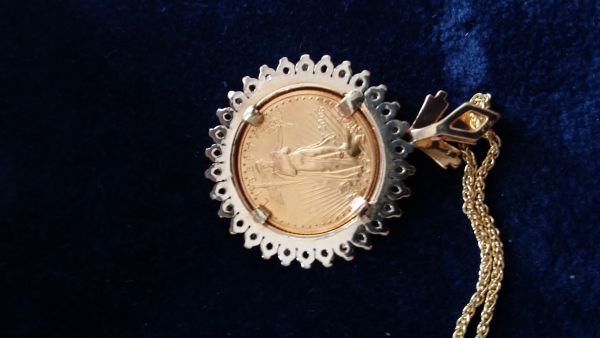2005-1/10-Gold-Eagle-Necklace....help!